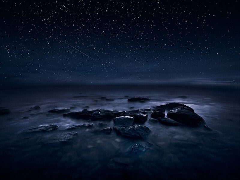 Meteor over Rocky Shore