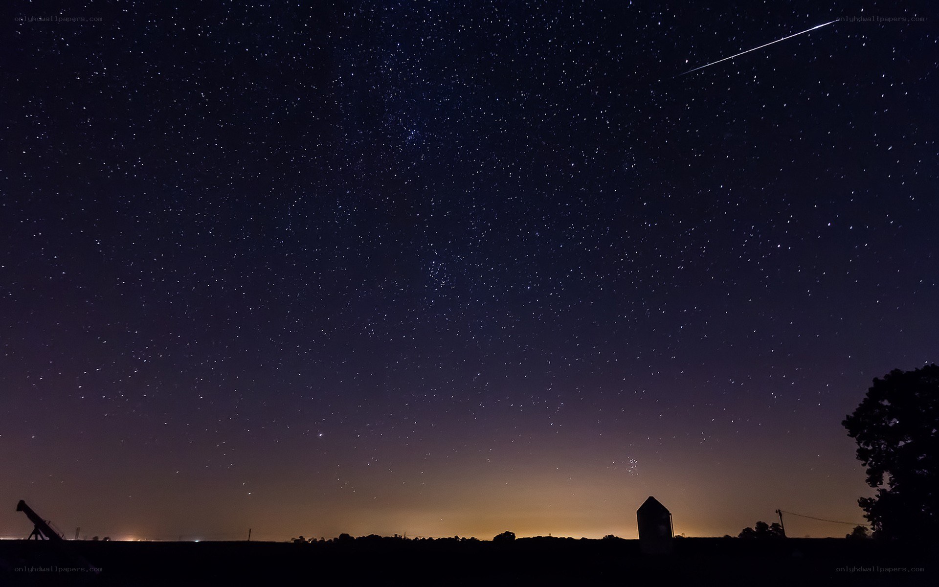 Meteor over starry night sky