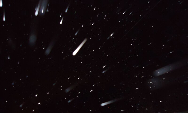 Meteor Shower in Night Sky