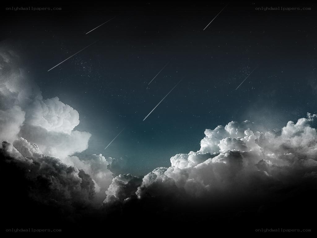 Meteor shower over clouds