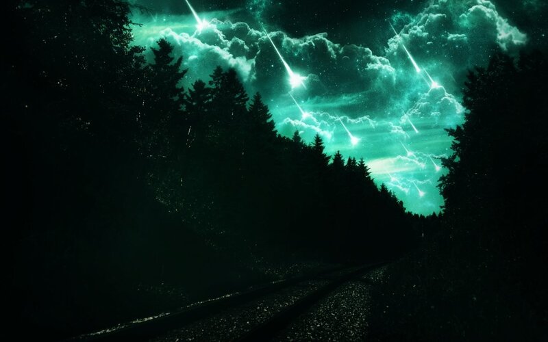Meteor shower over forest road