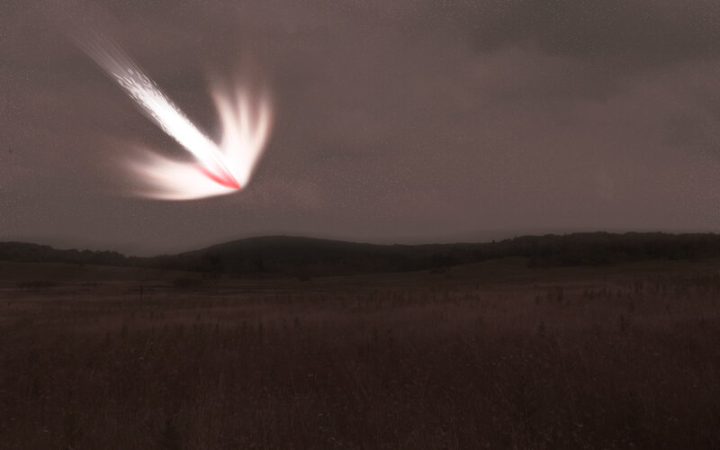 Meteor streaking across night sky
