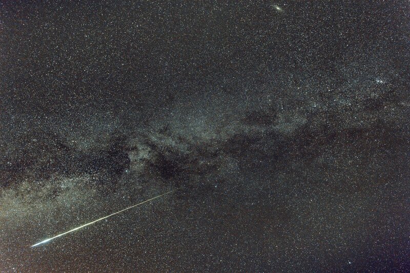 Meteor Streaking Across Sky — Black, Serene