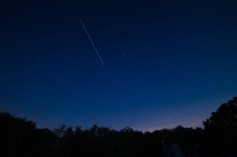 Meteor Streaking Across Sky — Blue, Serene, Night
