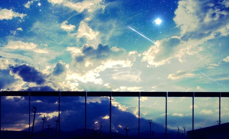 Meteor Streaking Across Sky — Blue