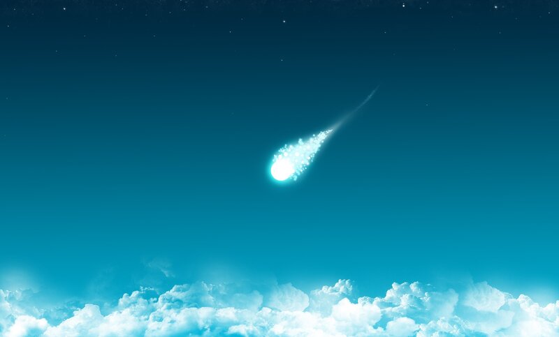 meteor streaking through night sky