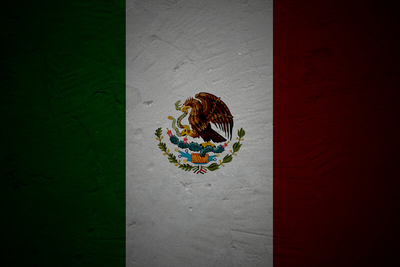 Mexican flag on textured wall