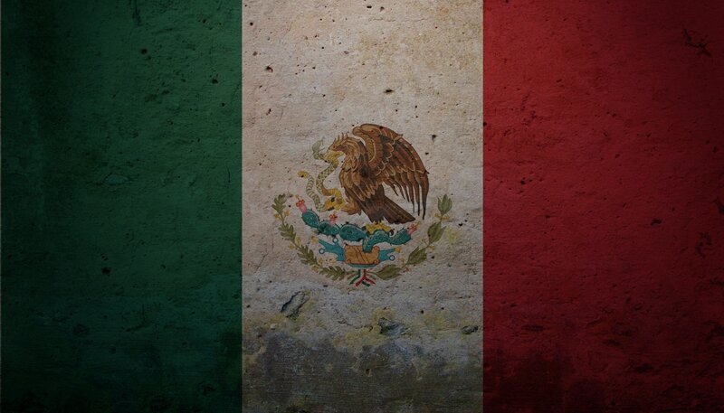 Mexican flag on textured wall