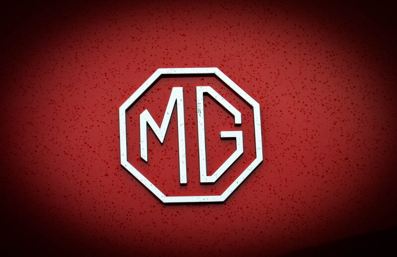 MG Logo on Red Surface