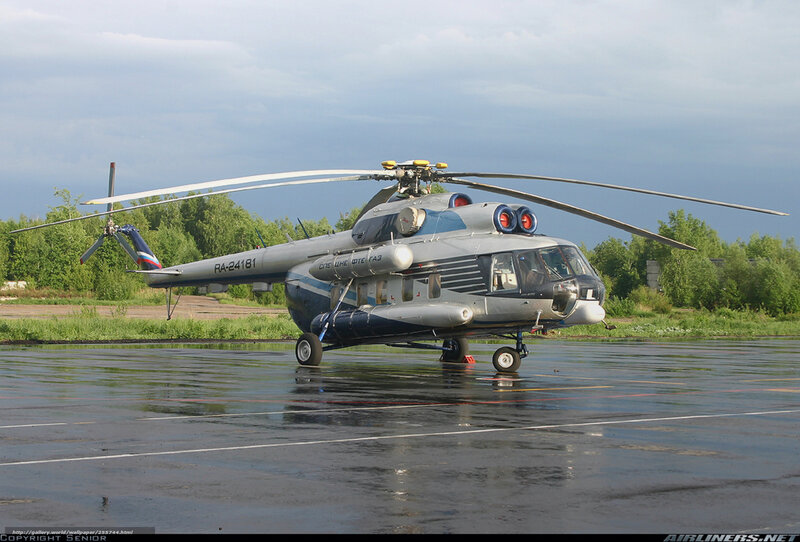 Mi-8 helicopter on wet tarmac