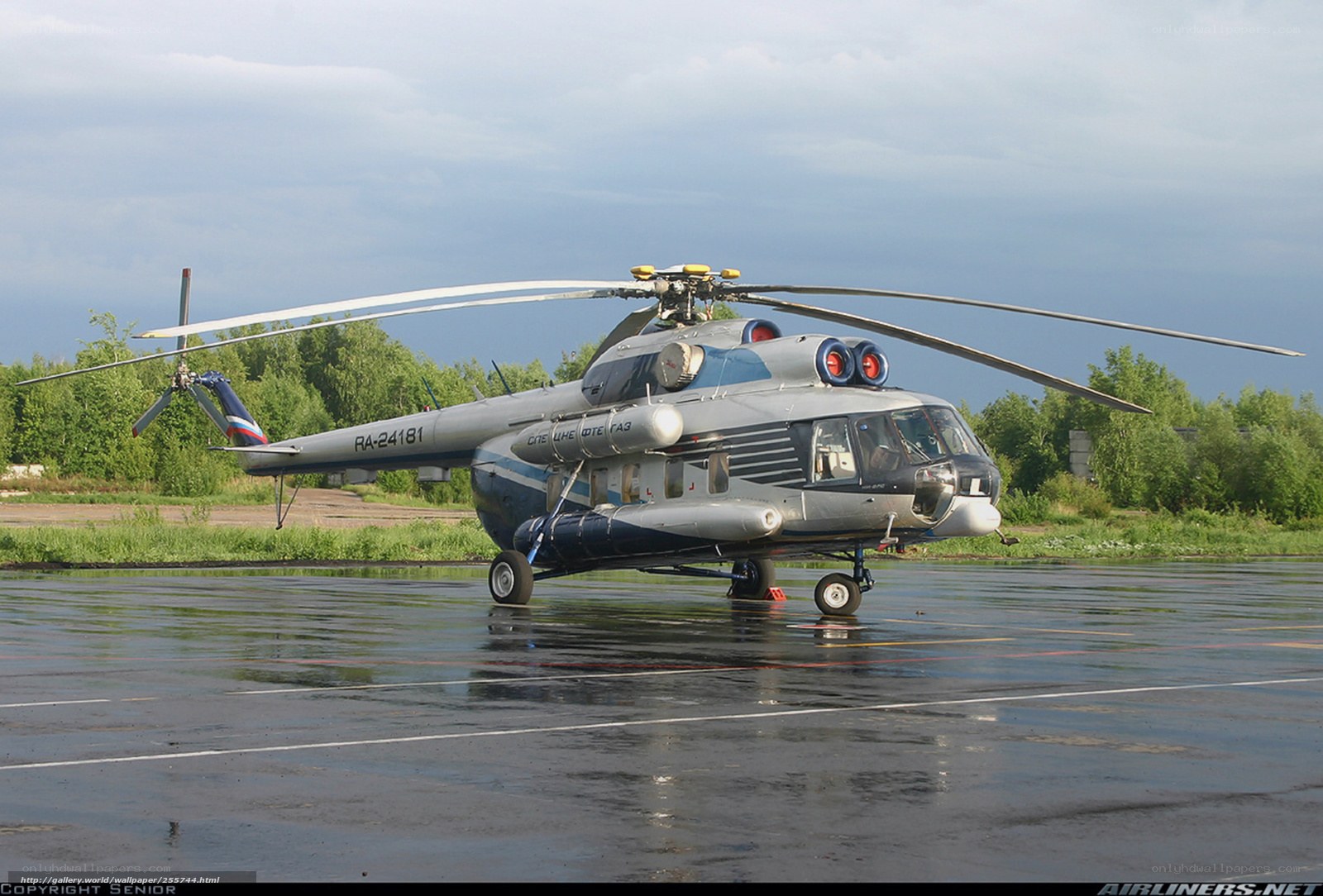 Mi-8 helicopter on wet tarmac