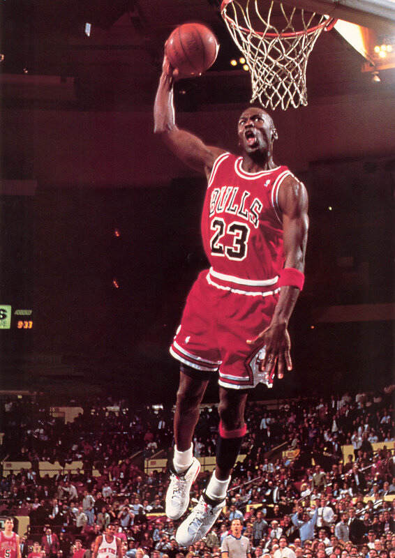 Michael Jordan dunks the ball