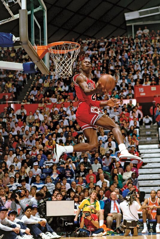 Michael Jordan dunks the ball
