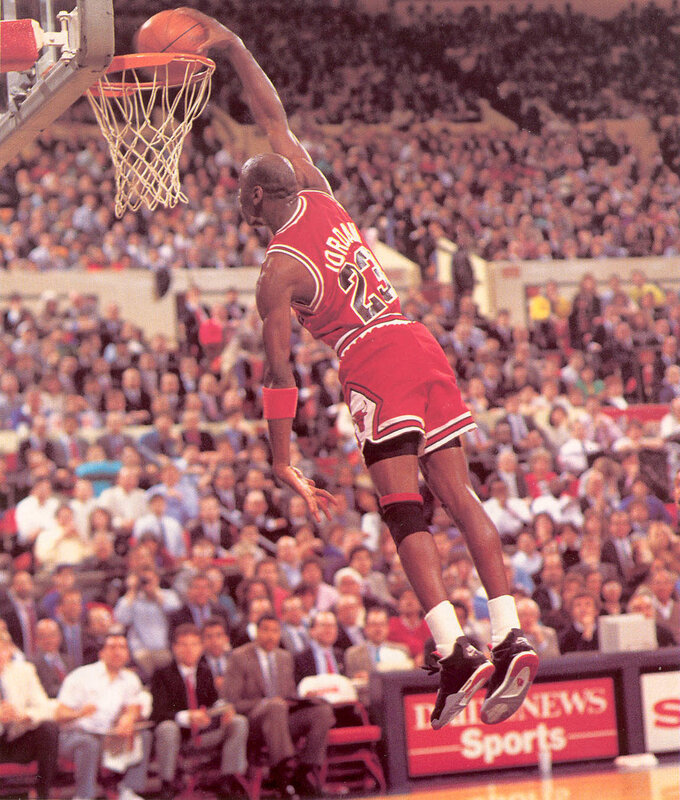 Michael Jordan dunks the ball