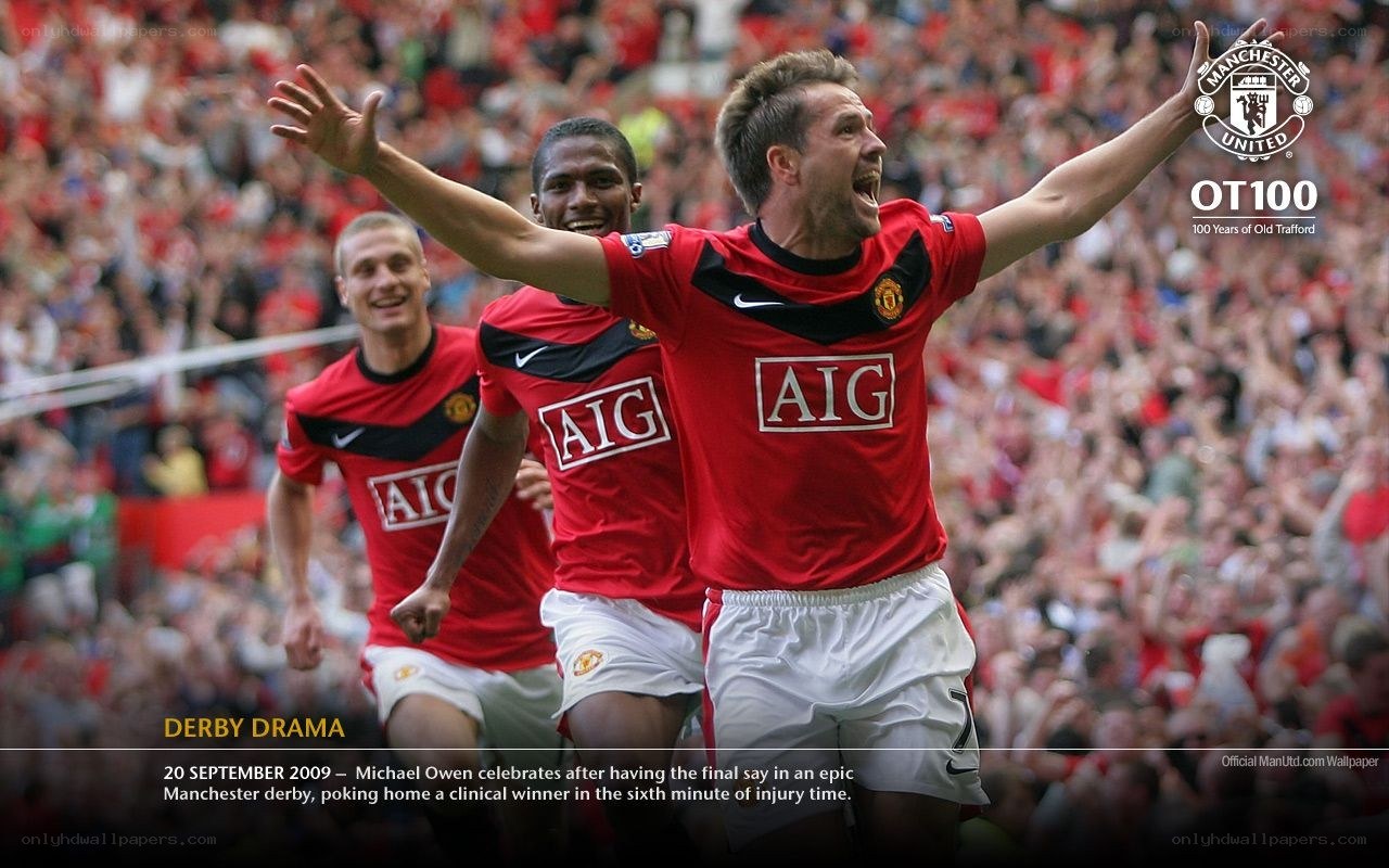 Michael Owen celebrates derby win