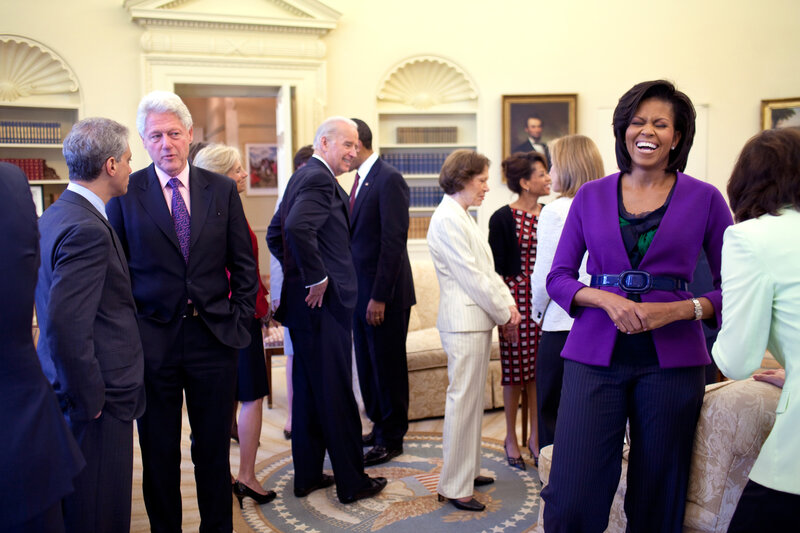 Michelle Obama laughing at event
