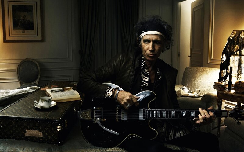 Mick Jagger with guitar