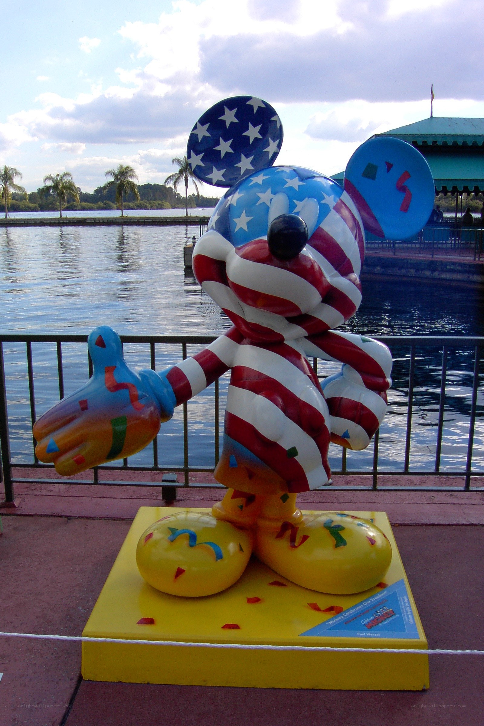 Mickey Mouse statue by water