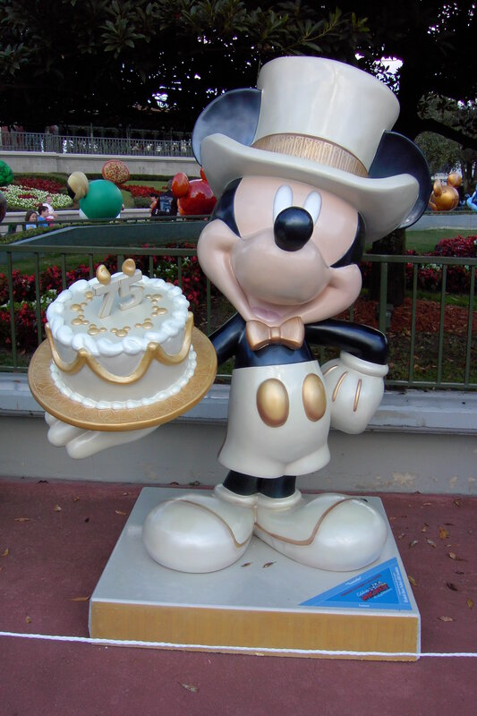 Mickey Mouse statue with cake