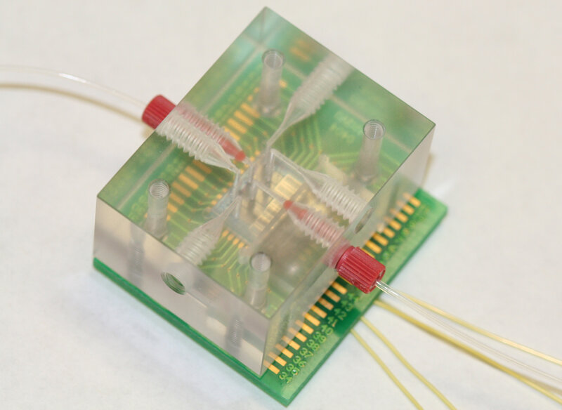 microfluidic device on circuit board