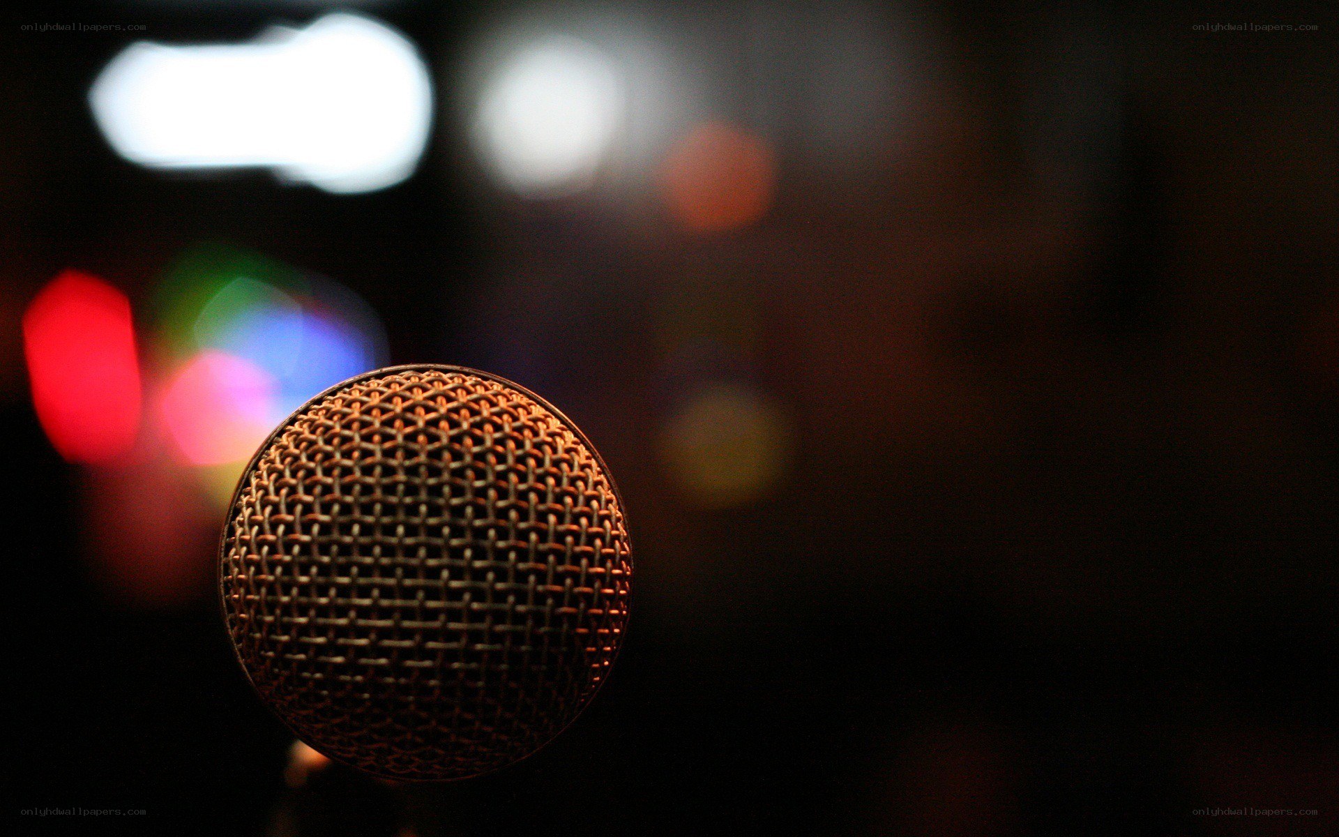 microphone on a dark stage