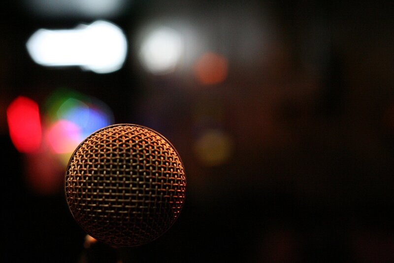microphone on a dark stage