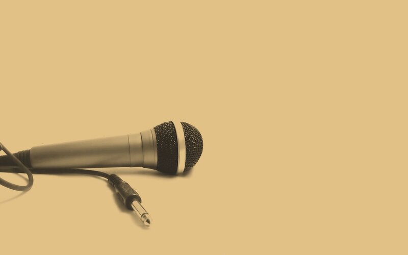Microphone on Beige Surface