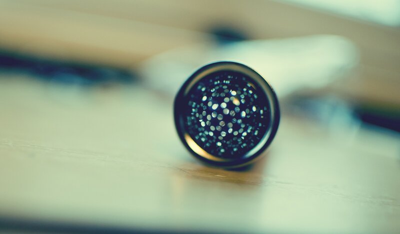 Microphone on Wooden Surface