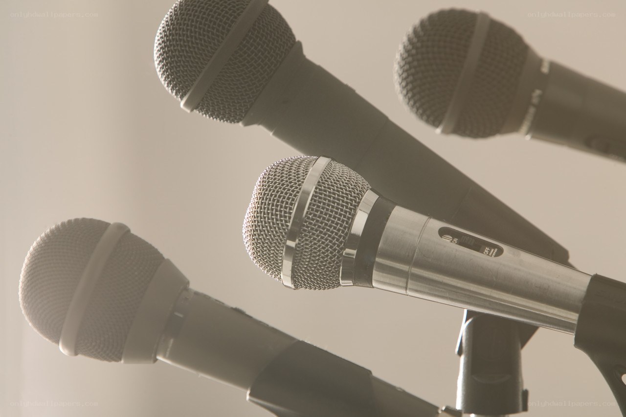 microphones at a press conference