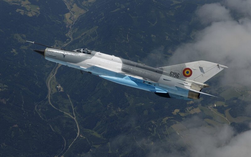 MiG-21 Fighter Jet — Gray, Aerial, Afternoon, Photograph, Mountains