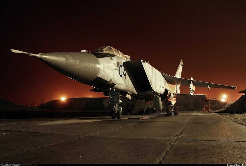 MiG-25 on the tarmac at night