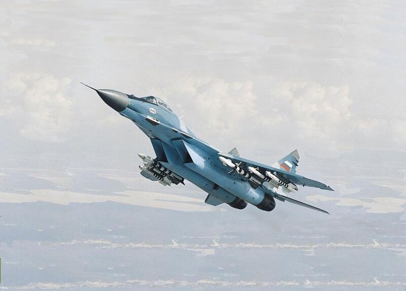 MiG-29 Fighter Jet — Blue, Dramatic, Photograph, Missiles, Clouds