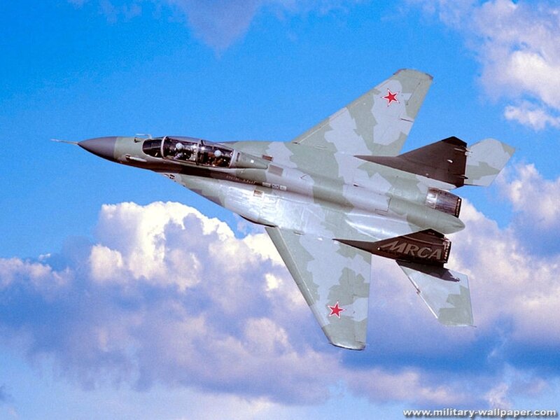 MiG-29 Fighter Jet — Blue, Dynamic, Afternoon, Photograph, Clouds