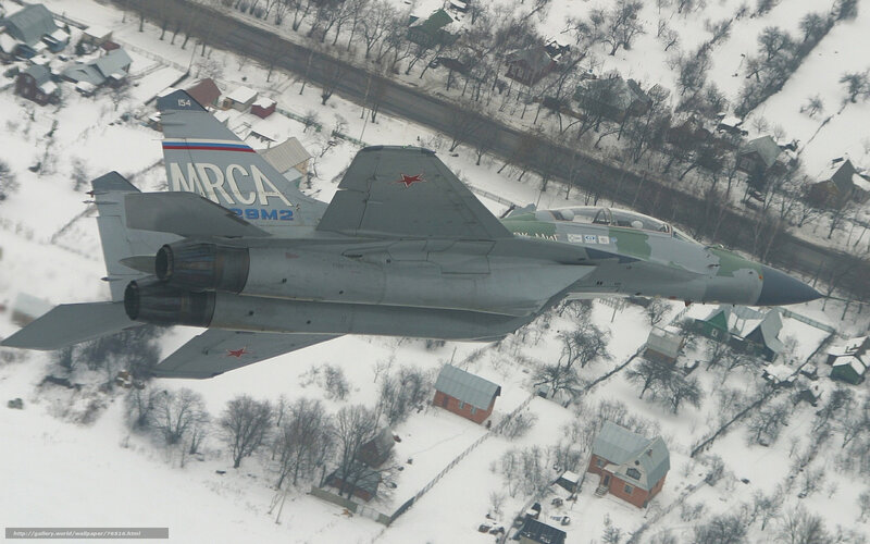 MiG-29 in flight over snow