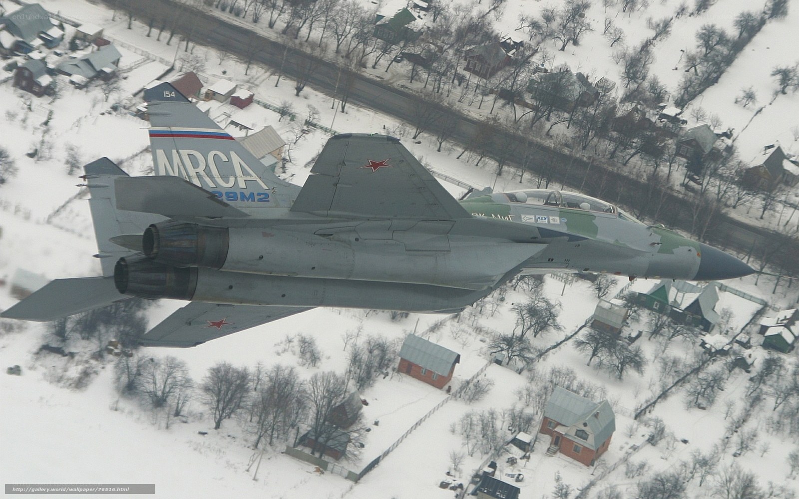 MiG-29 in flight over snow