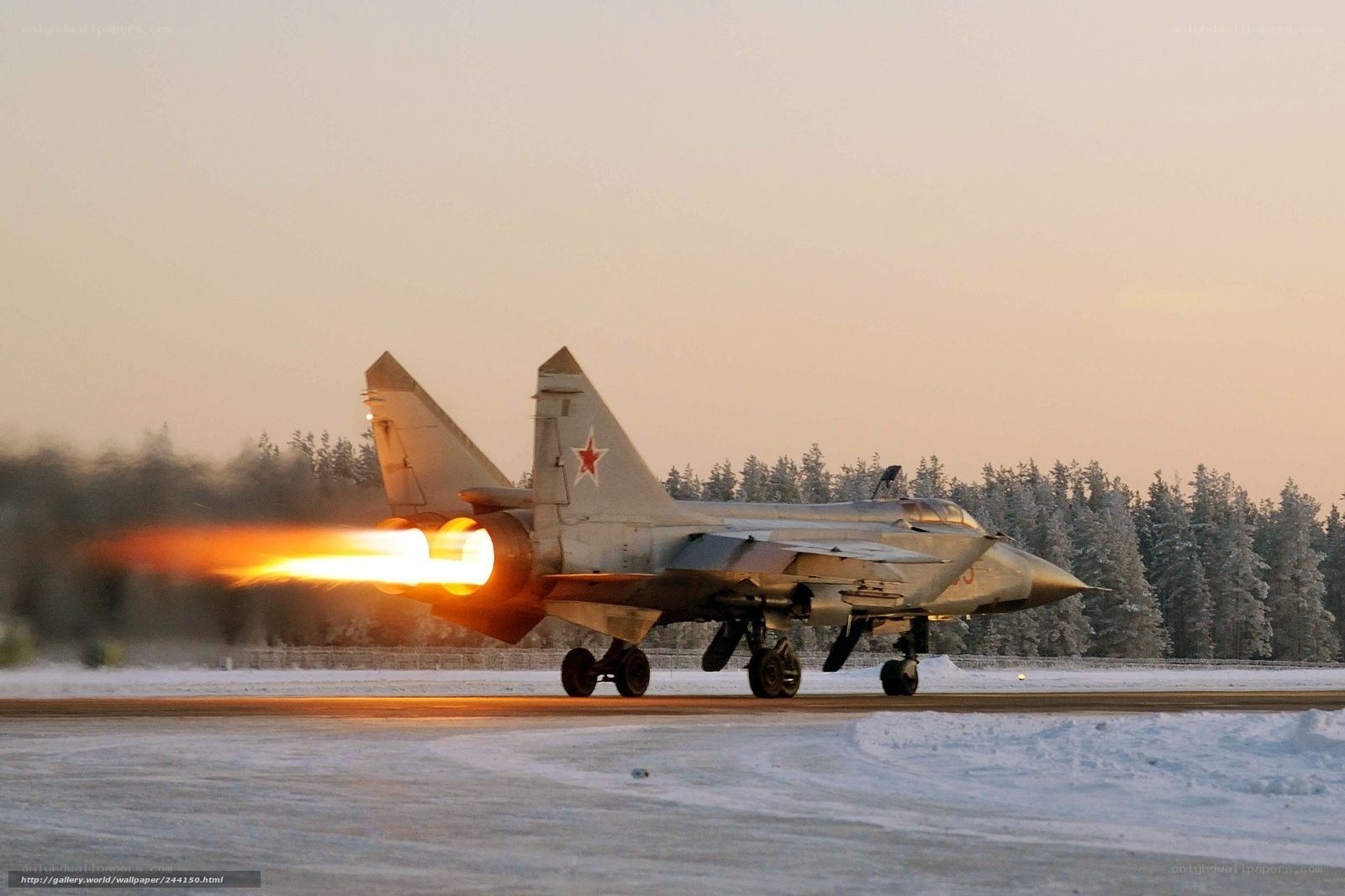 MiG-29 jet on snowy runway