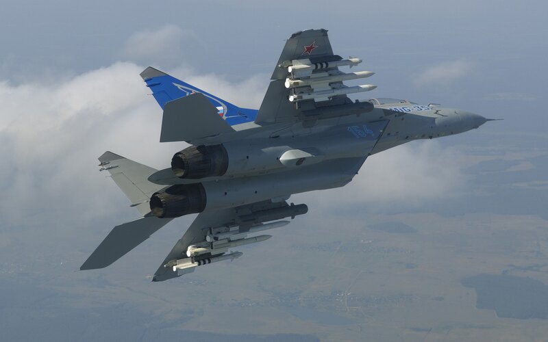 MiG-35 Fighter Jet — Gray, Dramatic, Afternoon, Photograph, Missiles