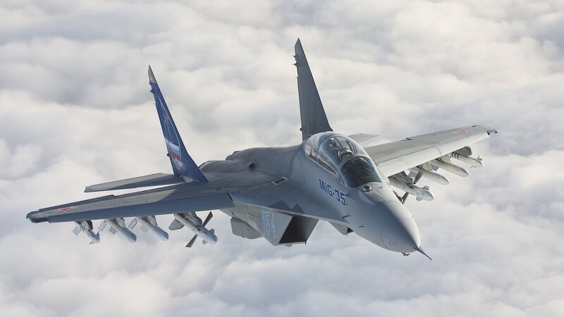 MiG-35 Fighter Jet — Gray, Dramatic, Photograph, Clouds, Missiles, Wings
