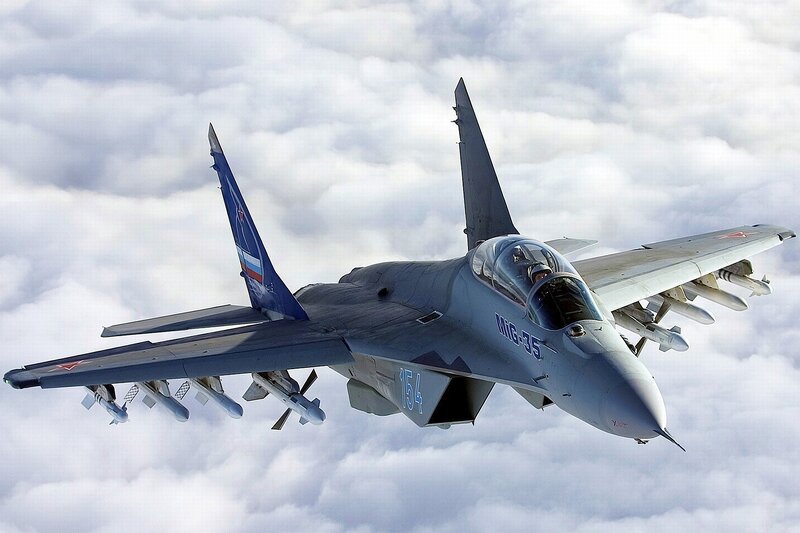 MiG-35 Fighter Jet — Gray, Dramatic, Photograph, Clouds