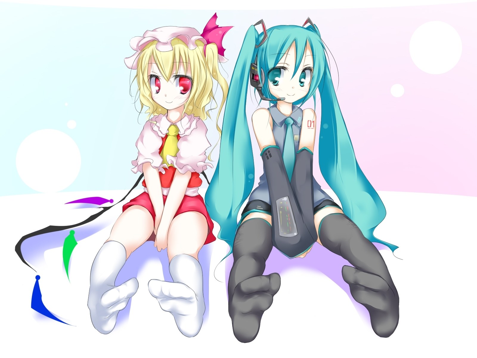 Miku and a girl sitting together