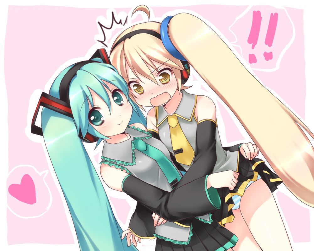 Miku and Rin hugging