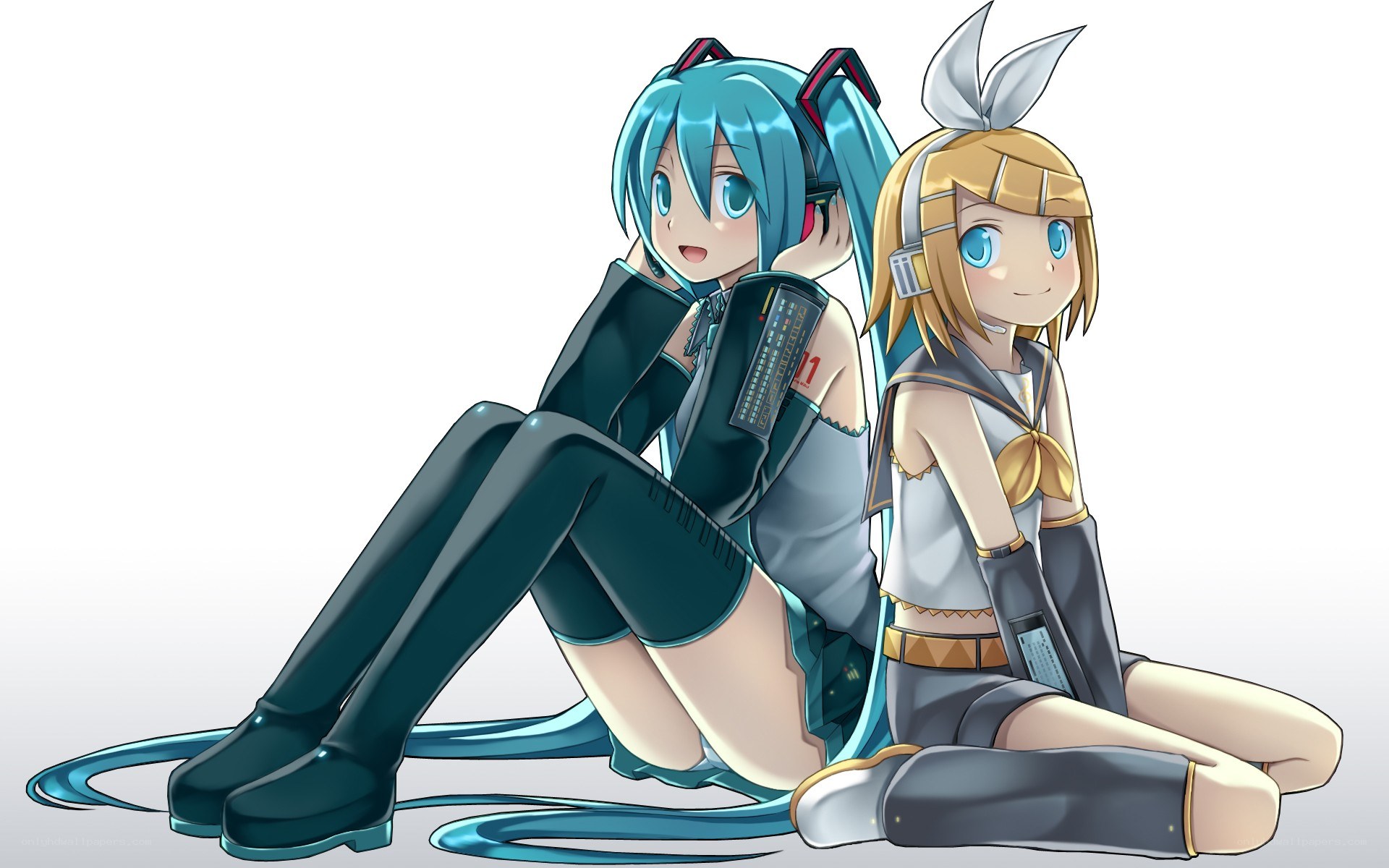 Miku and Rin sitting together