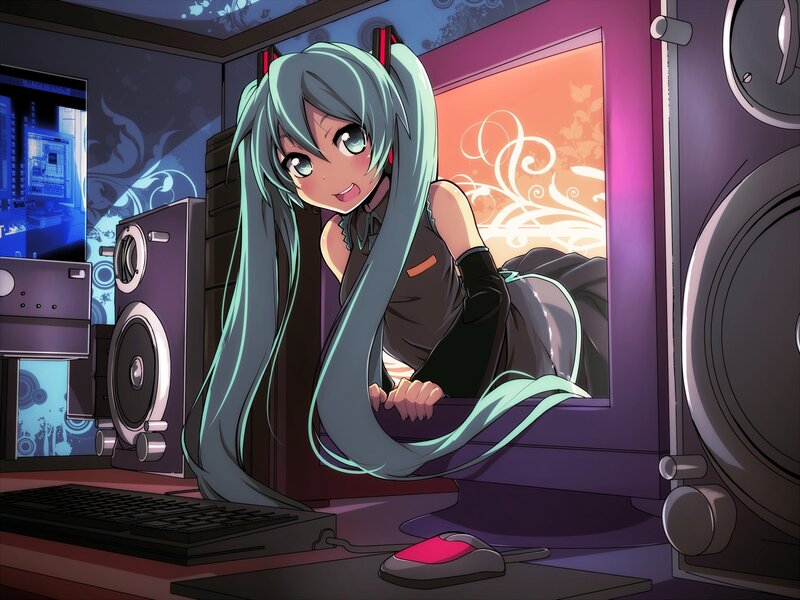 Miku at a computer desk