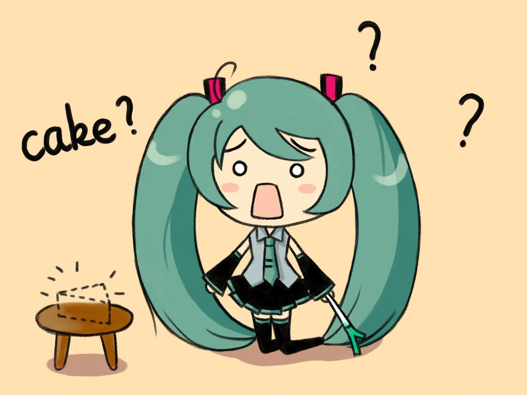 Miku confused by cake