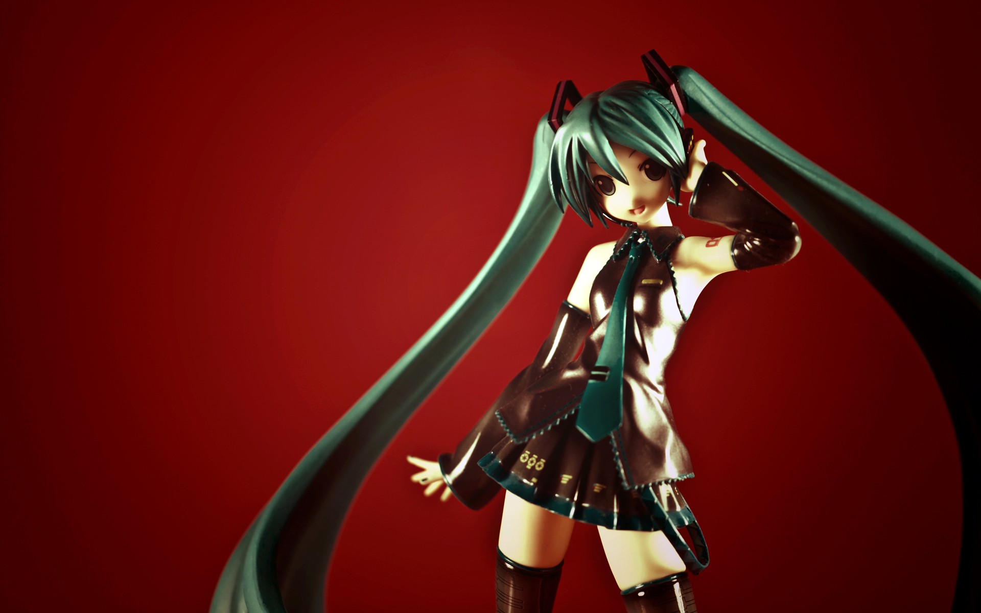 Miku figurine on red background