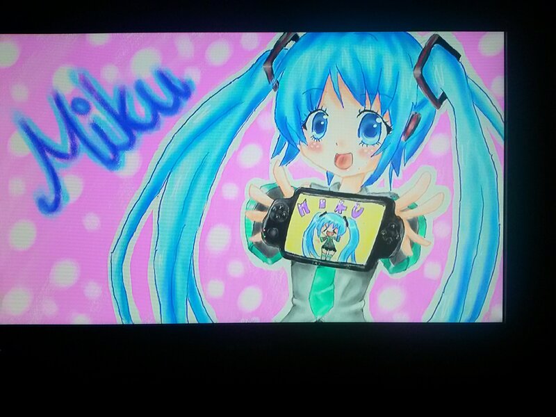 Miku Holding a Device