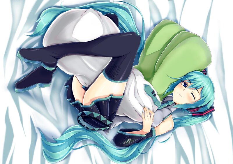 Miku lying on a pillow