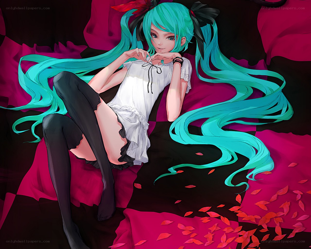 Miku lying on red fabric