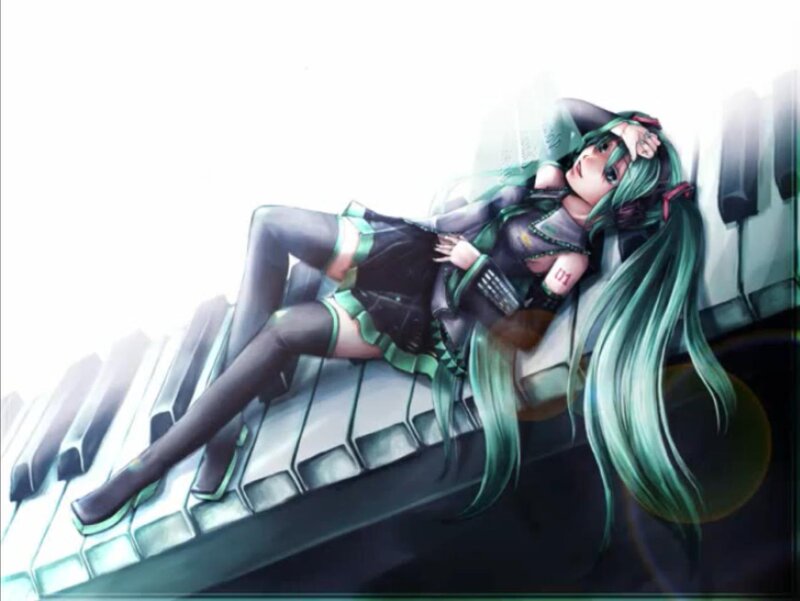 Miku on piano keys