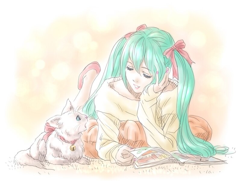 Miku reading with a cat